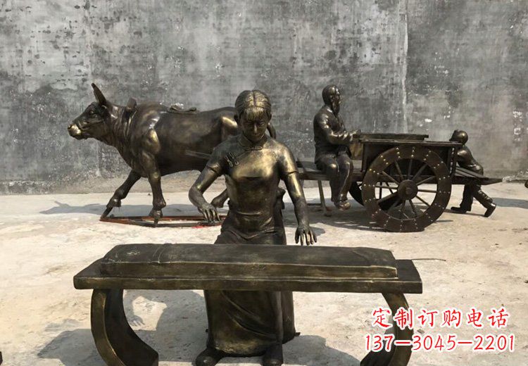 新乡弹古筝的美女铜雕