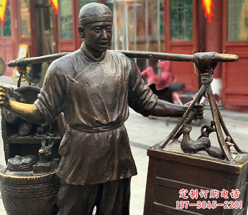 新乡铜雕步行街卖货郎人物雕塑