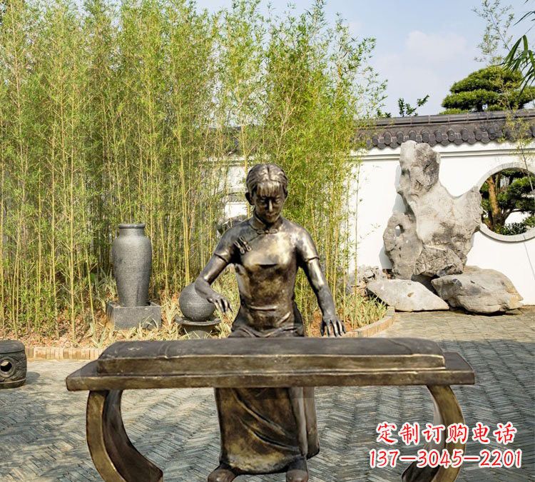 新乡铜雕弹古筝人物