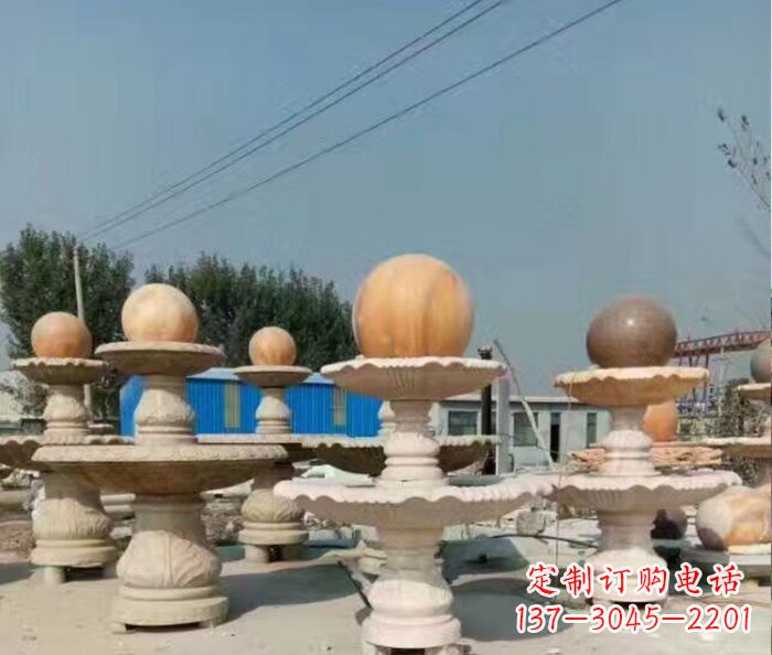 新乡晚霞红多层风水球喷泉石雕
