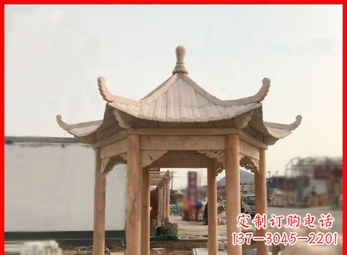 新乡晚霞红公园六角石雕凉亭