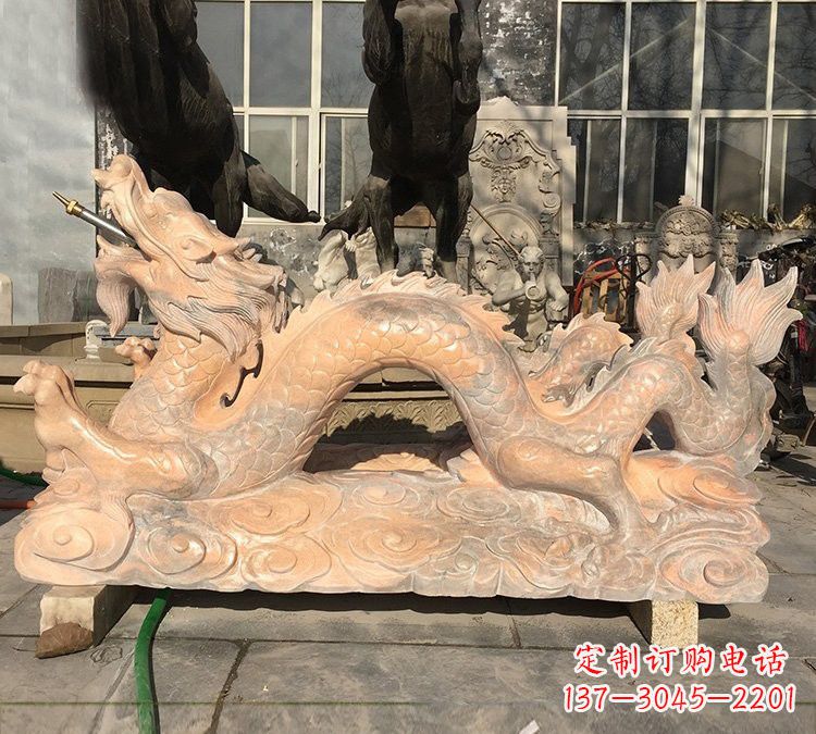 新乡晚霞红石雕喷水龙