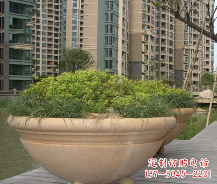 新乡小区景观晚霞红花盆石雕