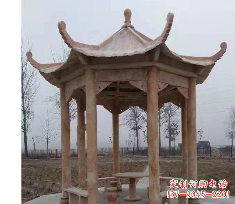 新乡公园晚霞红八角石雕凉亭
